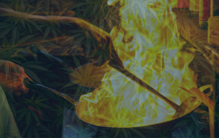 semi-transparent overlay of cannabis leaves over an image of a person cooking from a flaming frying pan